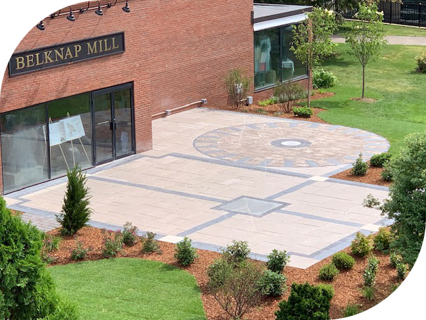 The completed patterned patio outside Belknap Mill in Laconia, from Tasker’s portfolio